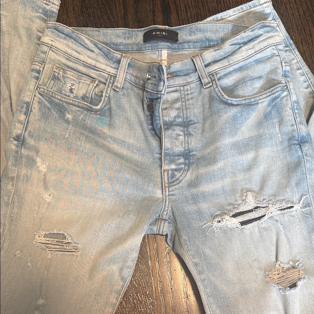 AMIRI Light Blue Ripped Denim Jeans